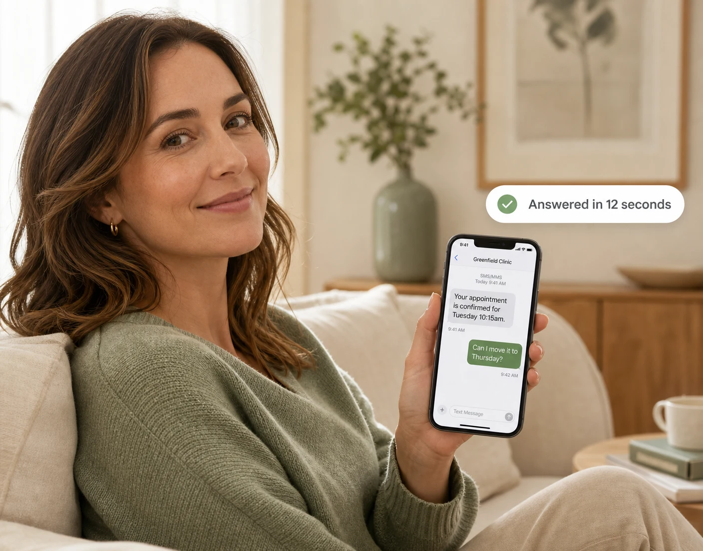 Patient using a phone to reach the clinic's secure conversation